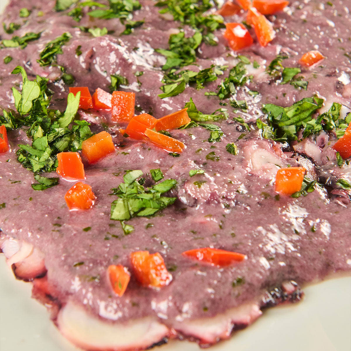 Carpaccio  de Pulpo con salsa al olivo